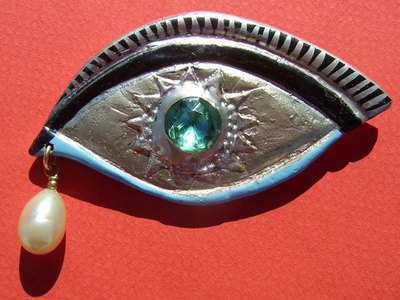 Eye-brooch